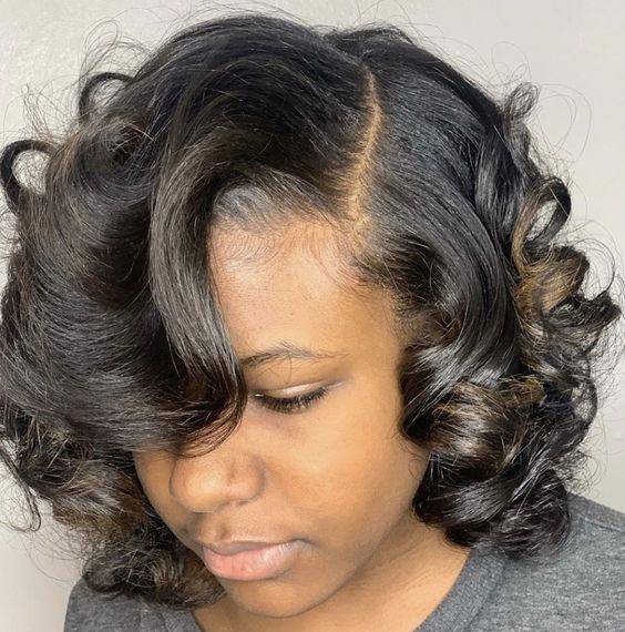 Angled Black Cut with Soft Curls hair style